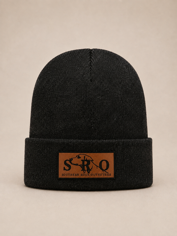 Black knit beanie with a brown leather SRO patch on the cuff.