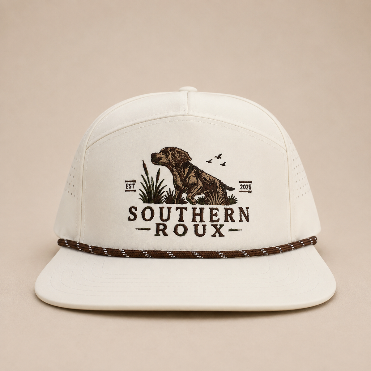 White seven-panel Southern Roux rope cap with embroidered dog-and-marsh logo.