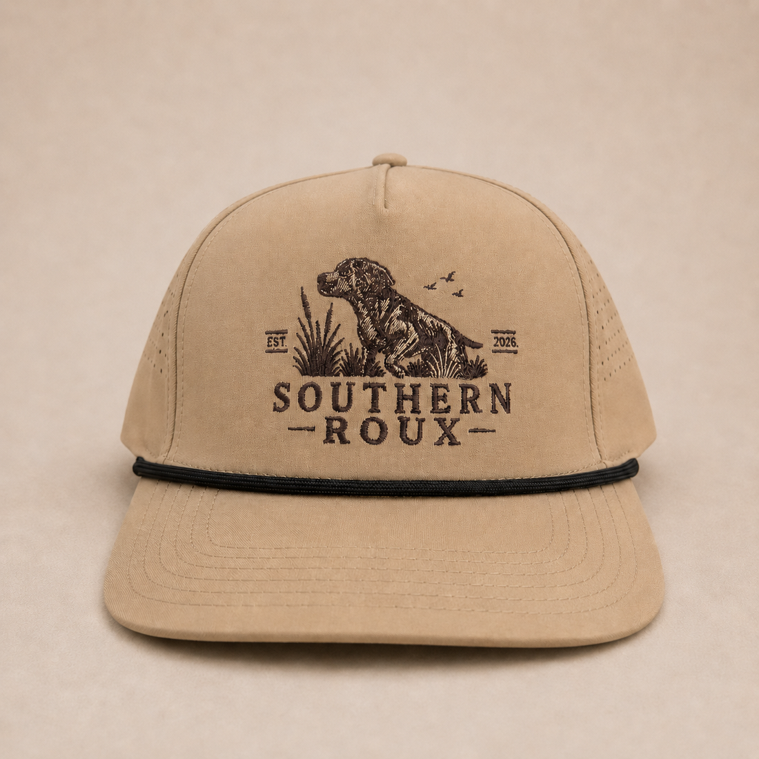Sand five-panel Southern Roux rope cap with embroidered dog-and-marsh logo.