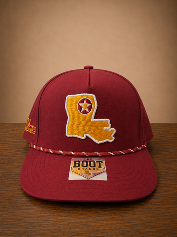 Maroon rope cap with Louisiana state embroidery on front and Monroe script embroidery on the side.